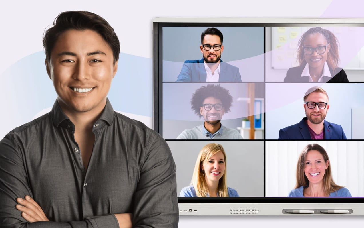 A confident man stands with a SMART Interactive display in the background showing a grid of team members, symbolizing digital transformation in a post-pandemic world.